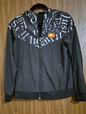 Nike Kids Black Hooded Windbreaker Jacket with White Script Accent